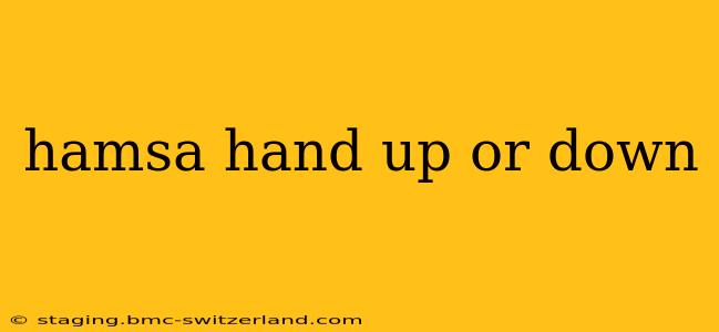 hamsa hand up or down